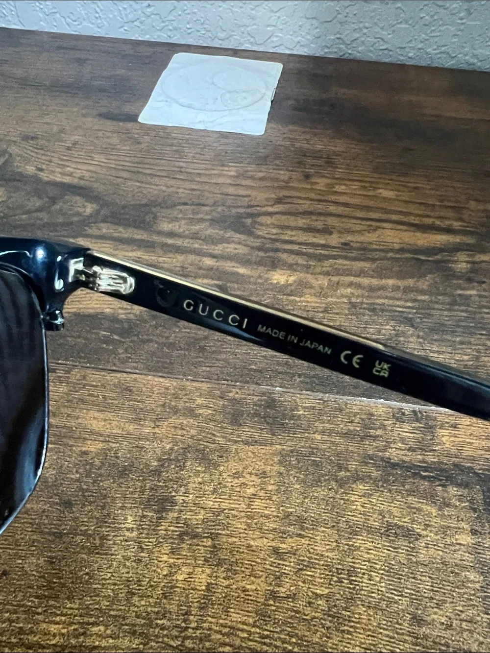 Gucci Black Sunglasses with Gold and Green Accents